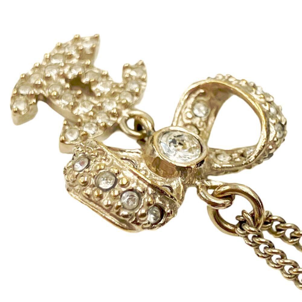 CHANEL Gold Logo Necklace - Picture 4 of 8